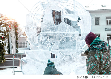 Vologda, Russia - February 15, 2025. Ice sculpture creation on the city's central square 131432306
