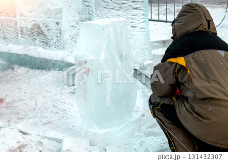 Vologda, Russia - February 15, 2025. Ice sculpture creation on the city's central square Vologda, Russia - February 15, 2025. Ice sculpture creation on the city's central square 131432307