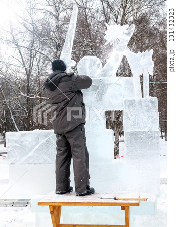 Vologda, Russia - February 15, 2025. Ice sculpture creation on the city's central square Vologda, Russia - February 15, 2025. Ice sculpture creation on the city's central square 131432323