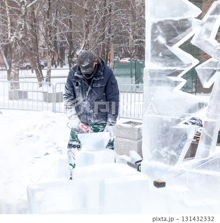 Vologda, Russia - February 15, 2025. Ice sculpture creation on the city's central square 131432332