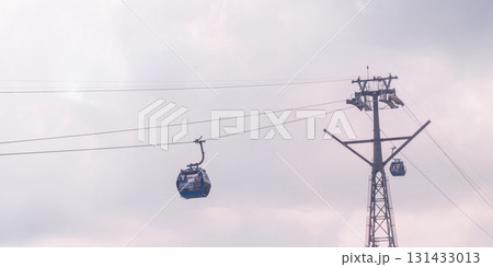 Shot of the cable cars with cloudy sky on background 131433013