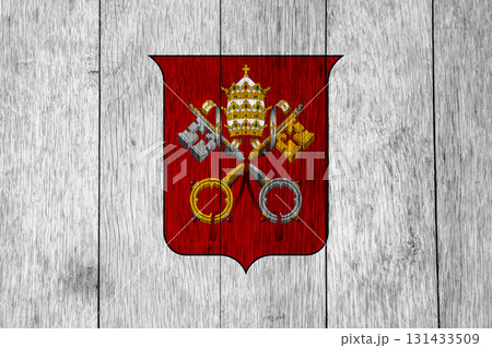 The official flag of the Vatican City, the Valican, on wood texture. Conceptual collage 131433509