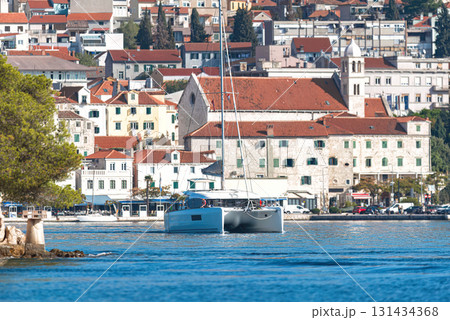 Sibenik cityscape with catamaran sailing Adriatic sea. Croatia 131434368