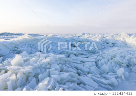 Ice ridges on the frozen Baltic Sea. Blue white landscape 131434412