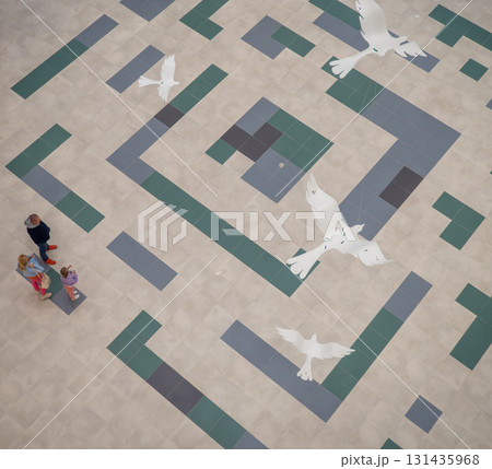 lobby of a new shopping center. Light walls of a shopping center. New Batumi Mall. A place to shop. Modern interior. Part of the interior. View from above 131435968