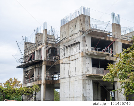 Abandoned construction site. Concrete frame of the building. Needs demolition. Crisis in the industry.  Construction freeze. Abandoned construction site. Concrete frame of the building. Needs demolition. Crisis in the industry.  Construction freeze. 131436746