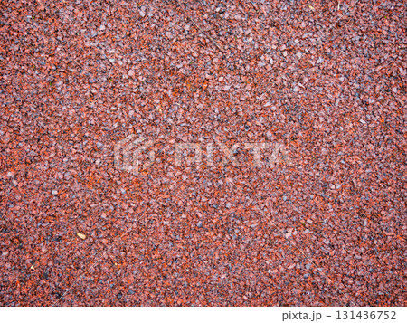 Brown texture. Polymer background. The surface of the playground. Ground for playing. Safe surface. Brown texture. Polymer background. The surface of the playground. Ground for playing. Safe surface. 131436752