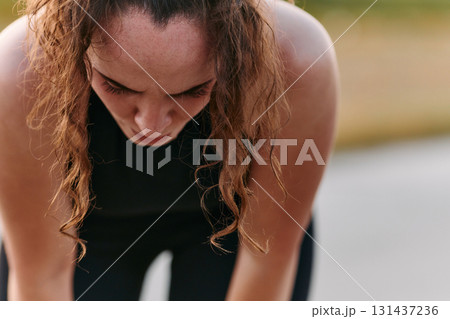 Woman Resting After Intense Run 131437236