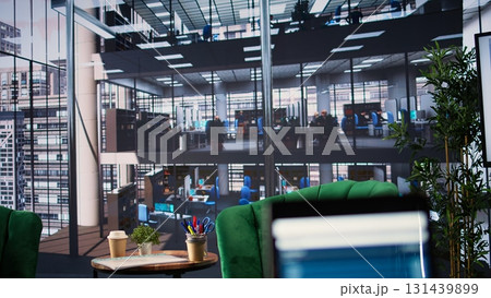 Modern luxurious conference room with a monitor showing data analytics, space used for business staff to discuss company ideas. Empty high end professional office enhances productivity. Modern luxurious conference room with a monitor showing data analytics, space used for business staff to discuss company ideas. Empty high end professional office enhances productivity. 131439899