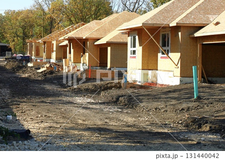 New suburban houses under construction New suburban houses under construction 131440042