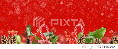 Red background with holiday ornaments and nature Red background with holiday ornaments and nature 131440392