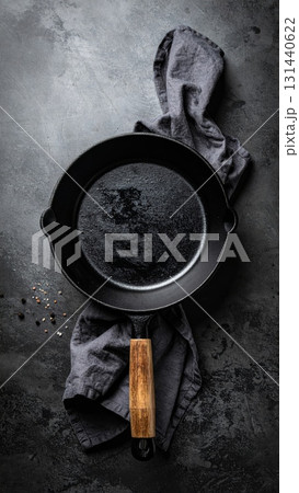 Cast Iron Pan on a Black Table 131440622