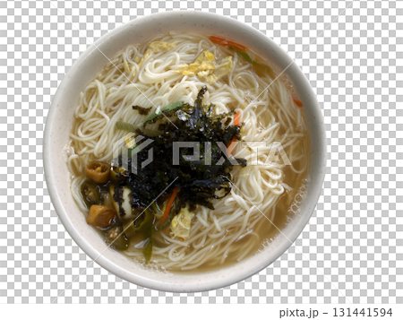 Comforting bowl of Korean noodle soup with egg seaweed and vegetables perfect for home meal Comforting bowl of Korean noodle soup with egg seaweed and vegetables perfect for home meal 131441594
