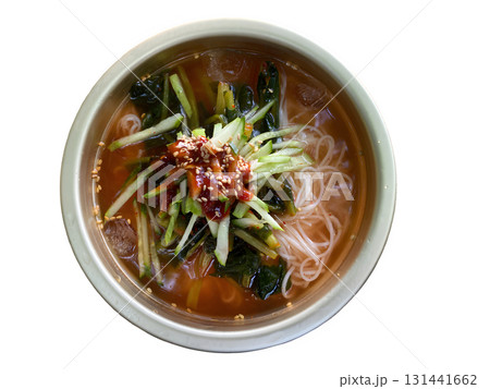 Refreshing Korean Young Radish Noodle Soup with Spicy Kimchi and Fresh Vegetables 131441662