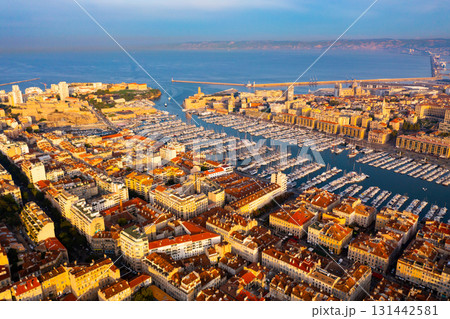 Drone view of Marseille on Mediterranean coast overlooking Old Port Drone view of Marseille on Mediterranean coast overlooking Old Port 131442581