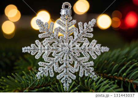 Glitter Snowflake Ornament Hanging On Christmas Tree 131443037