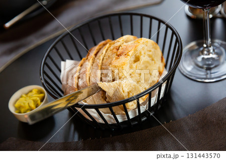 Slices of bread with butter 131443570