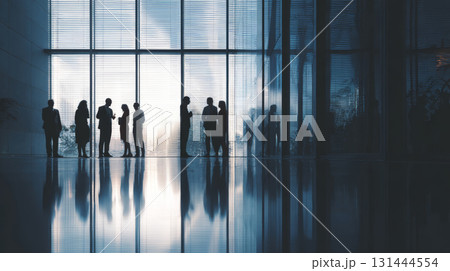 Business people office silhouette meeting teamwork modern glass window corporate professional reflection communication collaboration 131444554