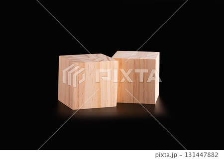 Wooden cubes on black 131447882