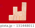 Wooden cubes on red 131448011