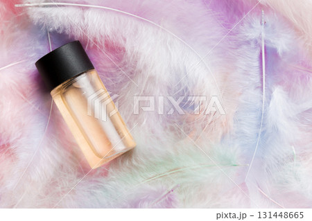 Spa cosmetic product, cream bottle, branding mock up, top view with feathers background. Flat lay Spa cosmetic product, cream bottle, branding mock up, top view with feathers background. Flat lay 131448665