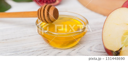 Flat lay composition with symbols jewish Rosh Hashanah holiday attributes on colored background, Rosh hashanah concept. New Year holiday Traditional. Top view with copy space Flat lay composition with symbols jewish Rosh Hashanah holiday attributes on colored background, Rosh hashanah concept. New Year holiday Traditional. Top view with copy space 131448690