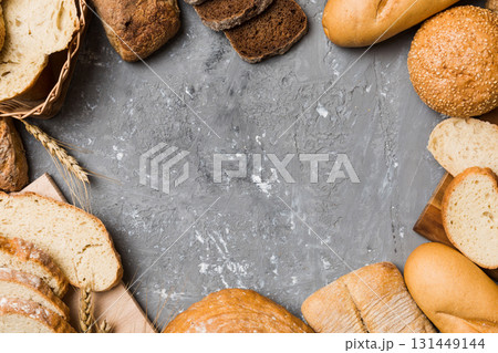Homemade natural breads. Different kinds of fresh bread as background, top view with copy space 131449144