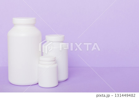 supplement pills with medicine bottle health care and medical top view. Vitamin tablets. Top view mockup bottle for pills and vitamins with green leaves, natural organic bio supplement, copy space supplement pills with medicine bottle health care and medical top view. Vitamin tablets. Top view mockup bottle for pills and vitamins with green leaves, natural organic bio supplement, copy space 131449482