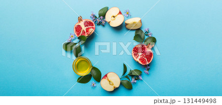 Rosh hashanah concept. Frame made of symbols jewish New Year holiday Traditional. Top view with copy space Rosh hashanah concept. Frame made of symbols jewish New Year holiday Traditional. Top view with copy space 131449498