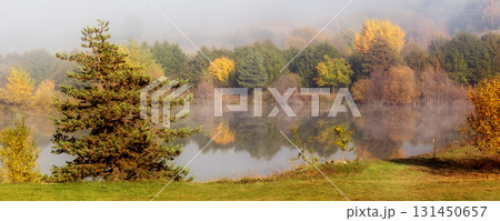 Autumn foggy forest and lake, banner 131450657