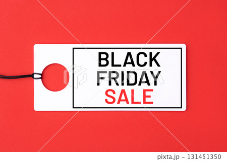 Black Friday tag on red background 131451350