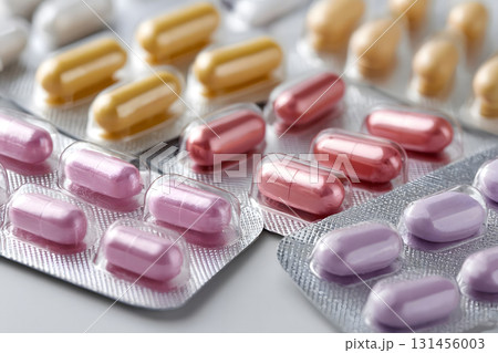 Assorted Colorful Capsules and Pills in Blister Packs 131456003