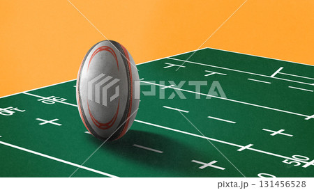 Contemporary collage. Oversized rugby ball on green marked field with orange background Contemporary collage. Oversized rugby ball on green marked field with orange background 131456528