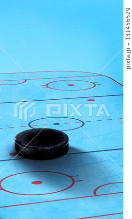 Bold colorful poster. Massive hockey puck on blue marked ice field Bold colorful poster. Massive hockey puck on blue marked ice field 131456529