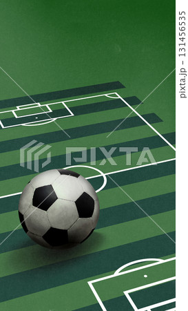 Bold colorful poster. Gigantic soccer ball on striped green football field 131456535