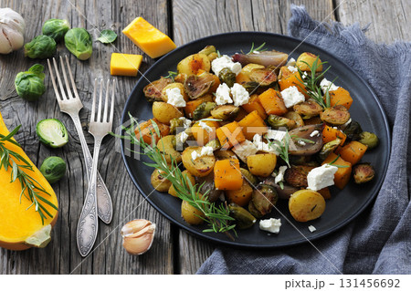 roasted autumn vegetable salad and feta cheese 131456692
