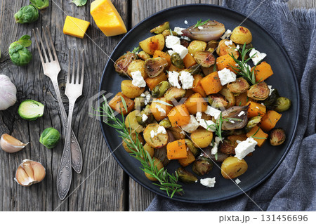 roasted autumn vegetable salad and feta cheese 131456696