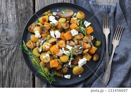 roasted autumn vegetable salad and feta cheese 131456697