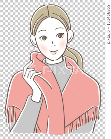 A woman draping a scarf over her shoulders 131456955