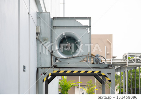 Blower unit at outdoors on exterior building. Blower unit at outdoors on exterior building. 131458096