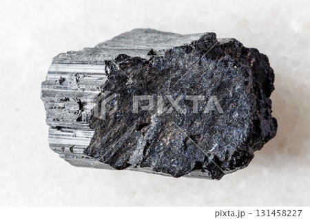 raw black tourmaline schorl mineral on white raw black tourmaline schorl mineral on white 131458227