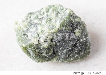 sample of raw green nephrite mineral on white sample of raw green nephrite mineral on white 131458245