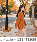 ベージュの大き目ニットを着て大通りを歩く美しい女性 ベージュの大き目ニットを着て大通りを歩く美しい女性 131458986