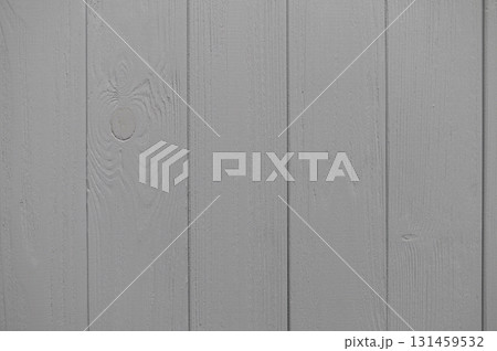 Close up view of dark gray painted wooden planks creating a rustic and textured background, for design projects ideal 131459532