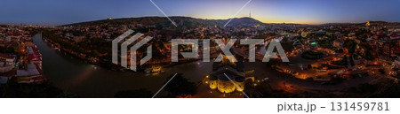 Tbilisi skyline at dusk with Kura river and city lights 131459781