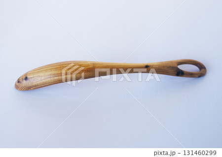 Wooden kitchen utensils stacked view close up isolated Wooden kitchen utensils stacked view close up isolated 131460299