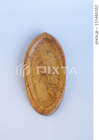 Wooden kitchen utensils stacked view close up isolated 131460302