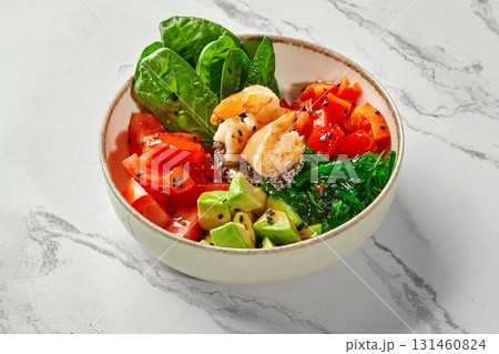 Healthy colorful hawaiian dish served in a bowl on a marble table 131460824