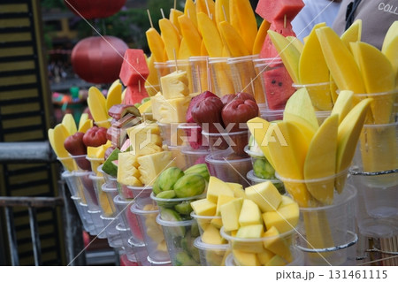 Tropical fruit cups set of summer lemonades in plastic cups for takeaway, colourful Lemonade in transparent cup, Lemonade to go cup with different fruits cocktail 131461115
