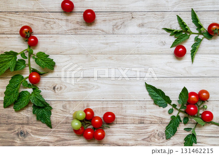 cherry tomatoes on wooden table background cherry tomatoes on wooden table background 131462215